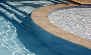 This is a picture of a swimming pool and hot tub with clean and clear water in Amarillo, Texas.